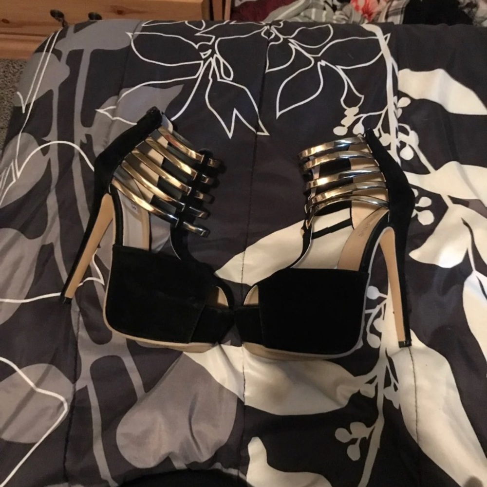 Black and gold pump heels